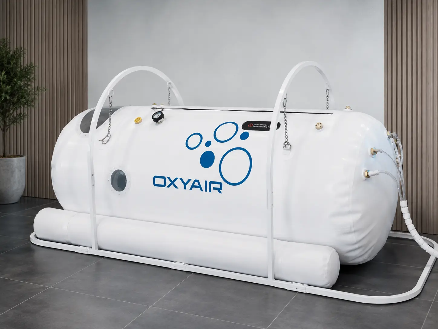 Oxyair Soft Flat liggende trykkammer set fra siden i interiørmiljø